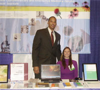 Dr. Phil Tonkins, Jr. and Ms. Shea Buckman staff OCCAM's booth at the Society for Integrative Oncology 3rd International Conference.
