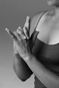 female doing yoga meditative pose