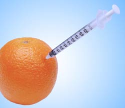 Orange and syringe