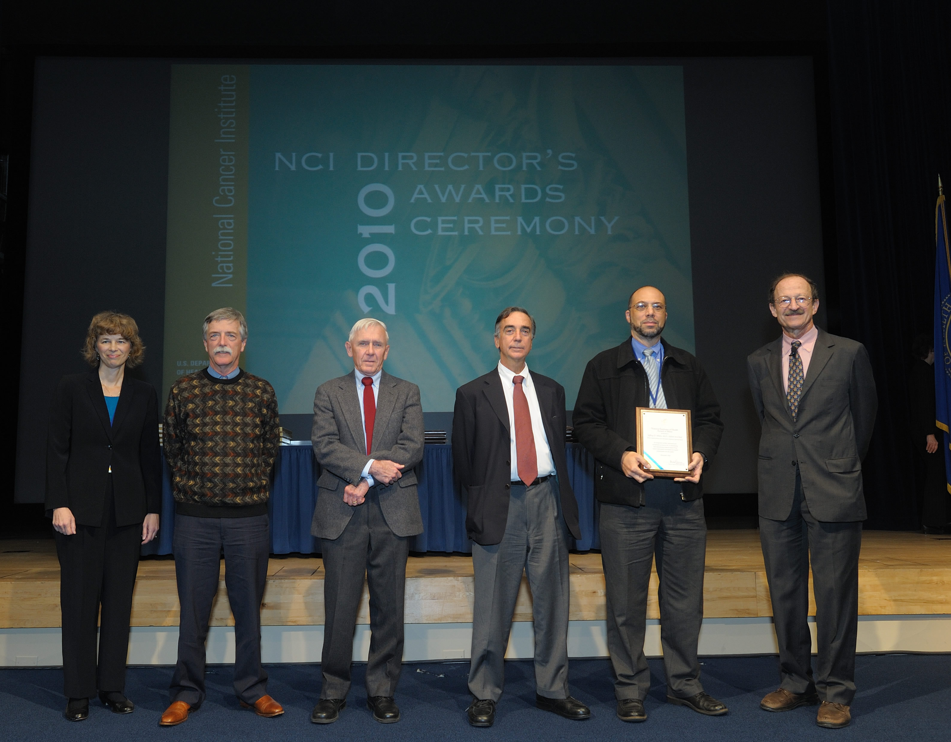 Several members of the PDQ CAM Editorial Board accept the NIH Merit Award